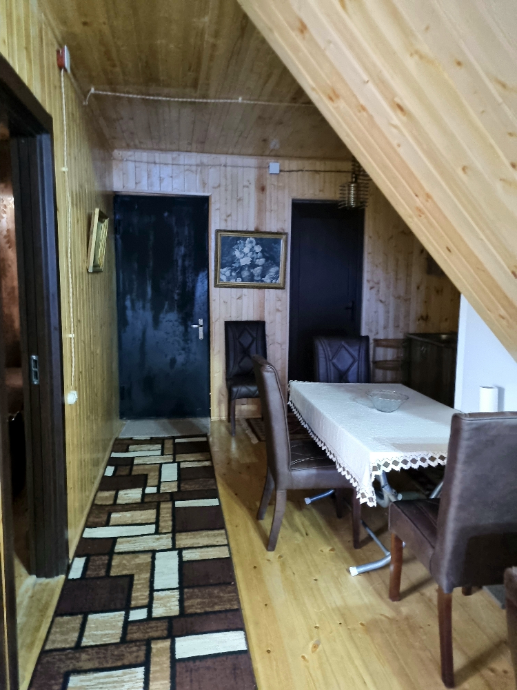 Фото Comfortable wooden Cottage in Ambrolauri