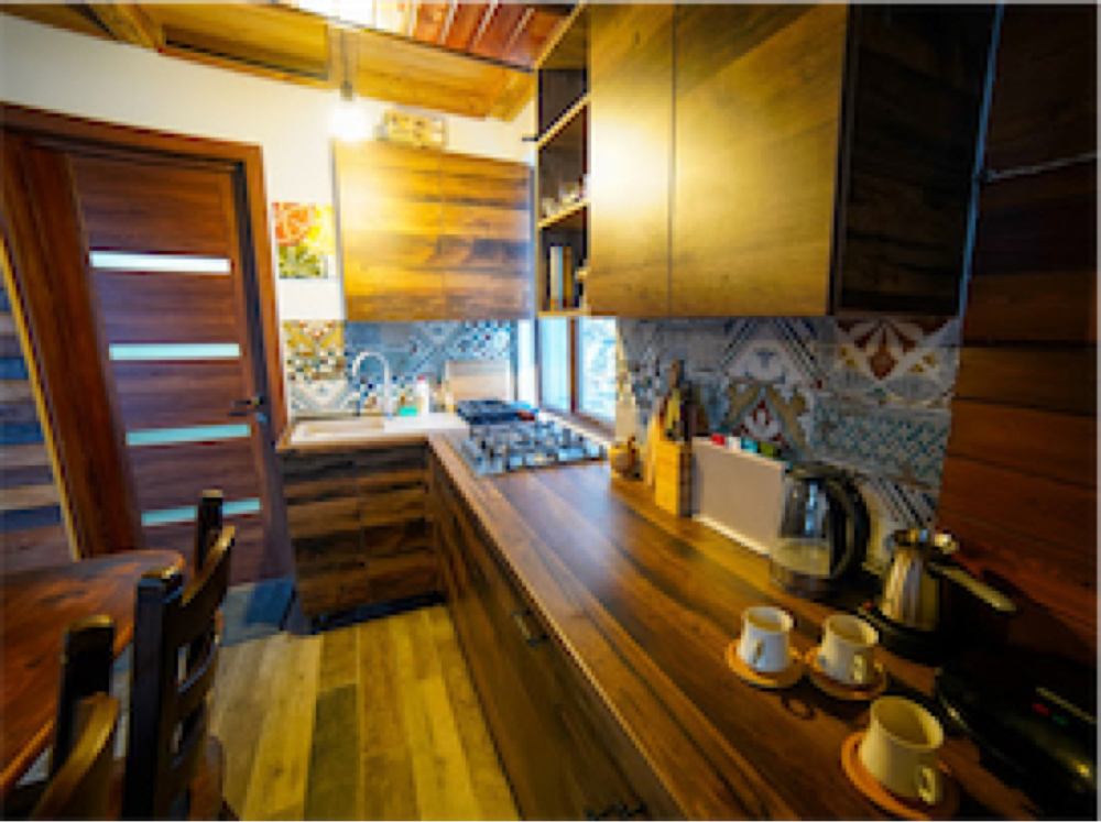 Photo of Wooden cozy Cottage in Nikortsminda