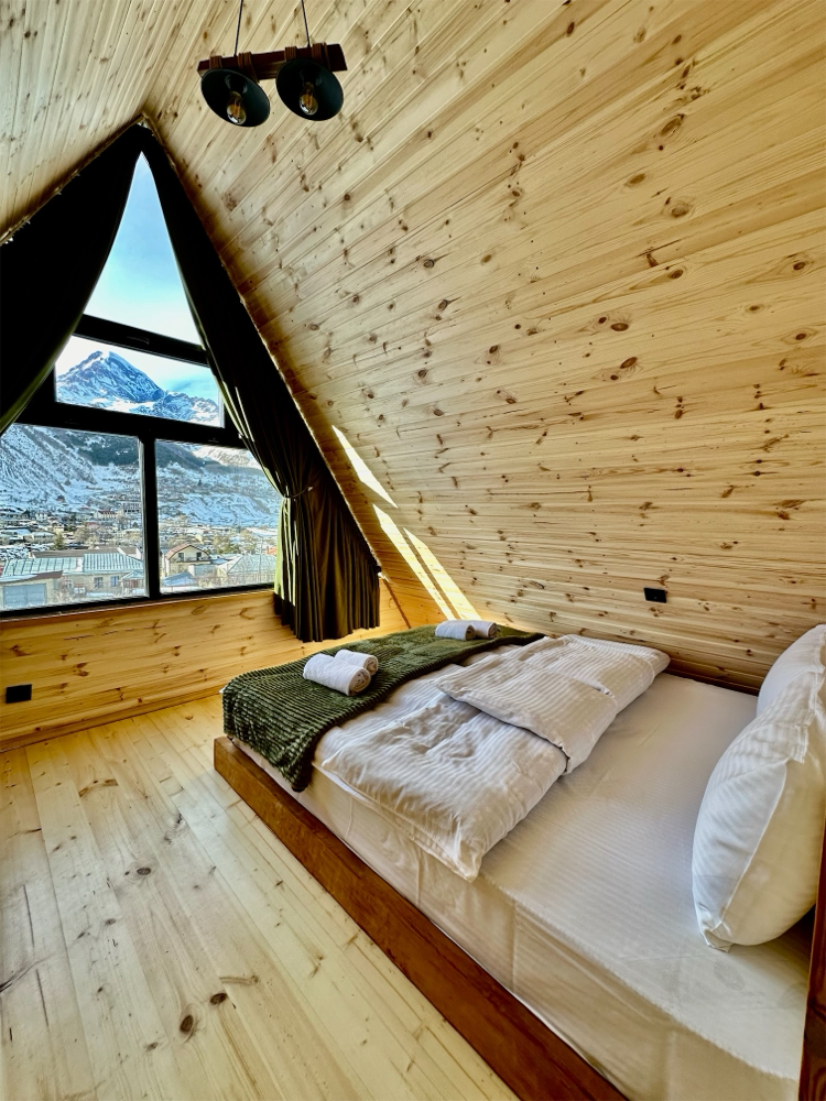 Photo of Wooden family-friendly Cottage in Stepantsminda
