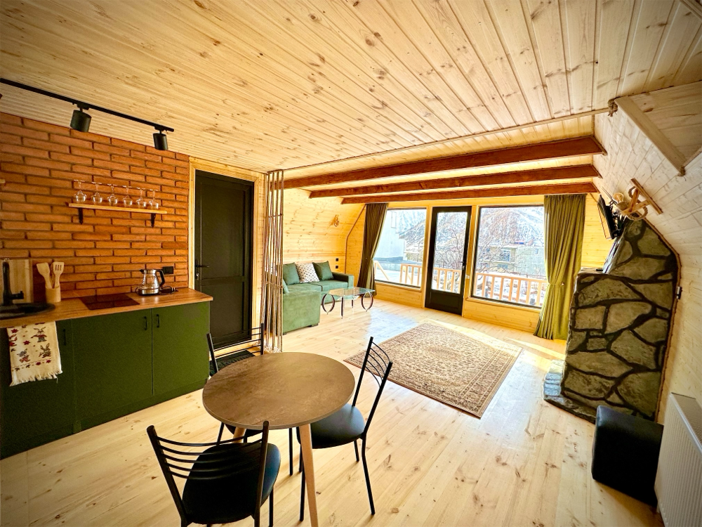 Photo of Wooden family-friendly Cottage in Stepantsminda