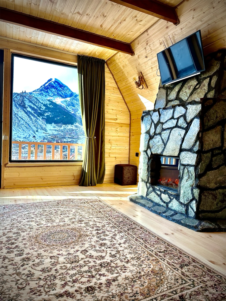 Photo of Wooden family-friendly Cottage in Stepantsminda