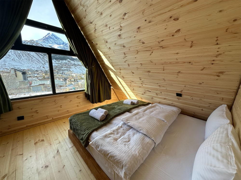 Photo of Wooden family-friendly Cottage in Stepantsminda