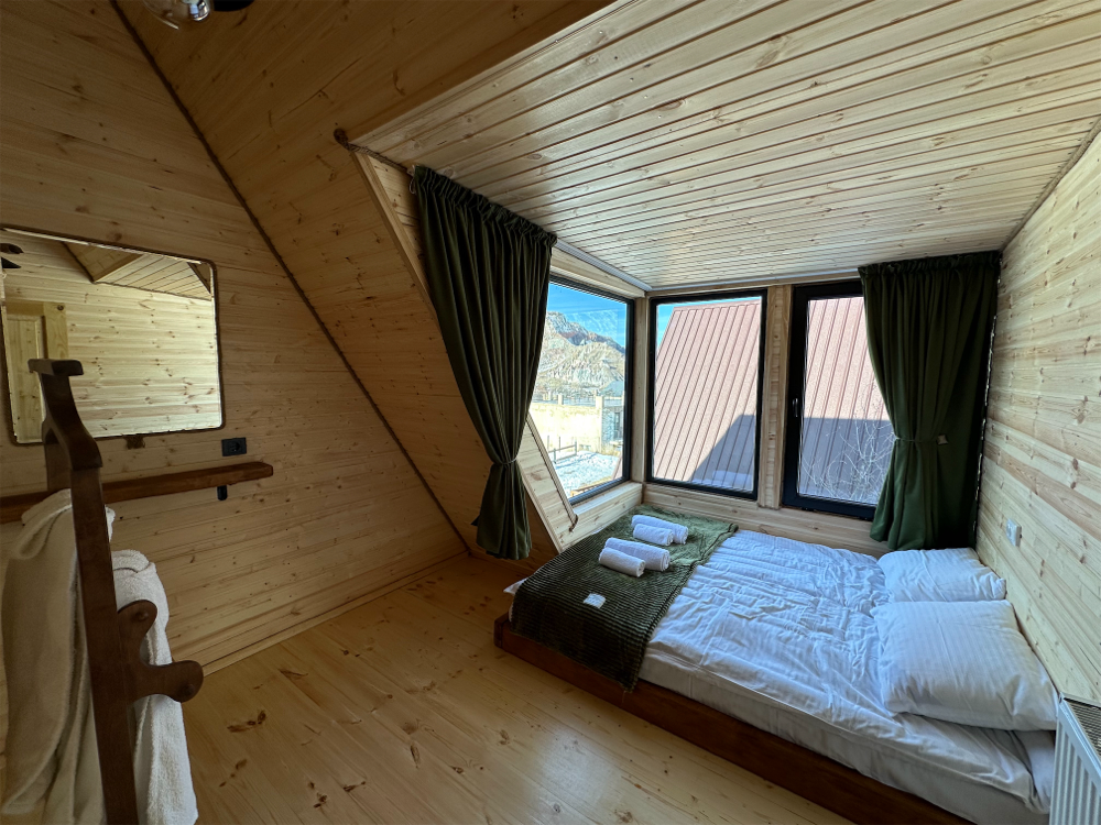 Photo of Wooden family-friendly Cottage in Stepantsminda
